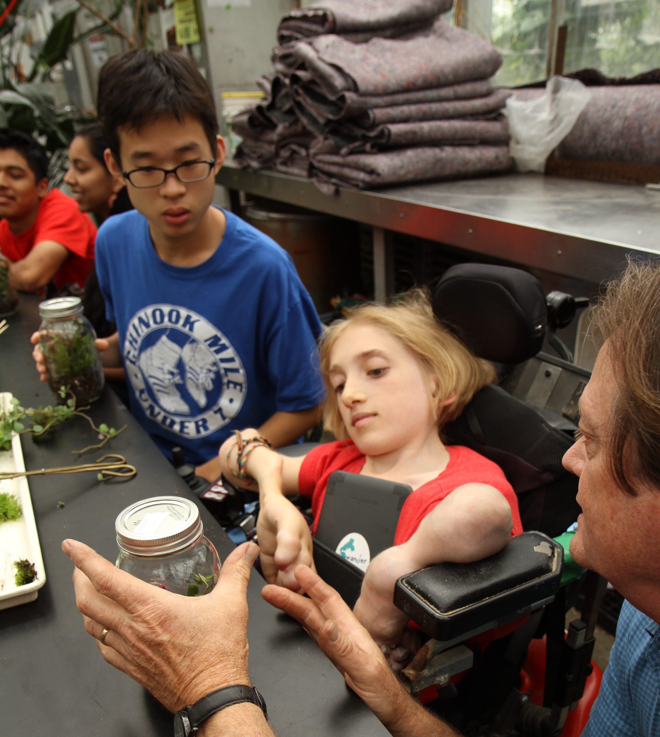 High school students with disabilities learn about the natural world at the UW Botany Greenhouse.
